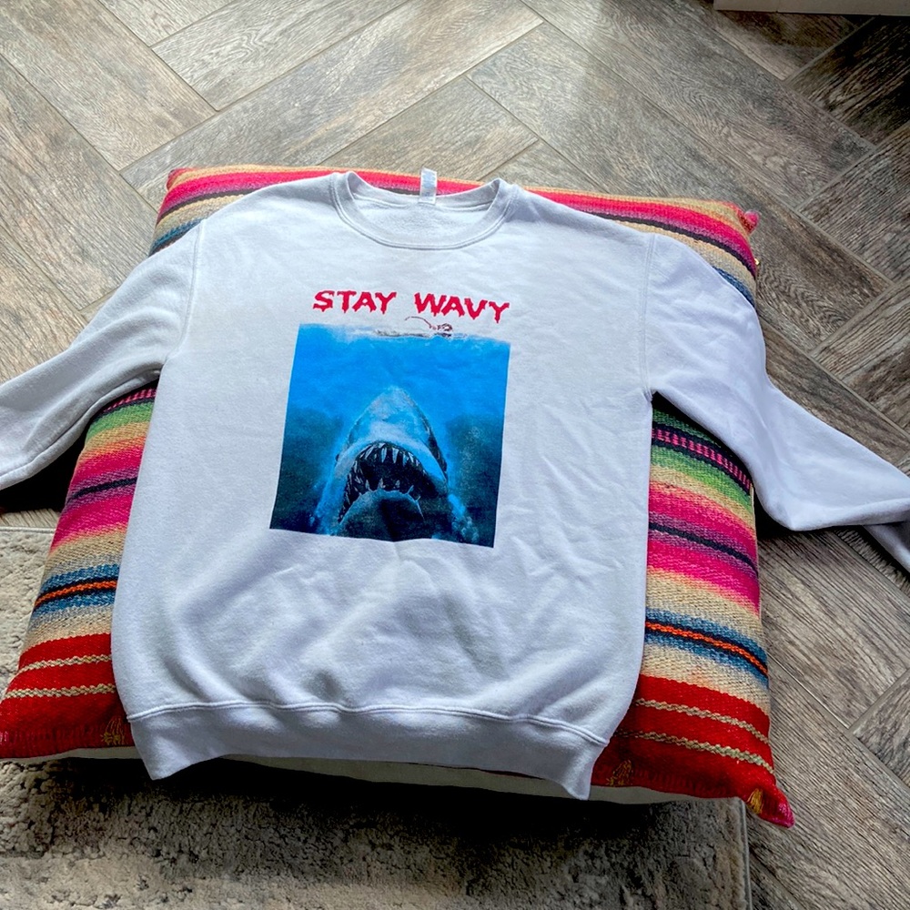 I’m selling a white sweater from Martha’s Vineyard